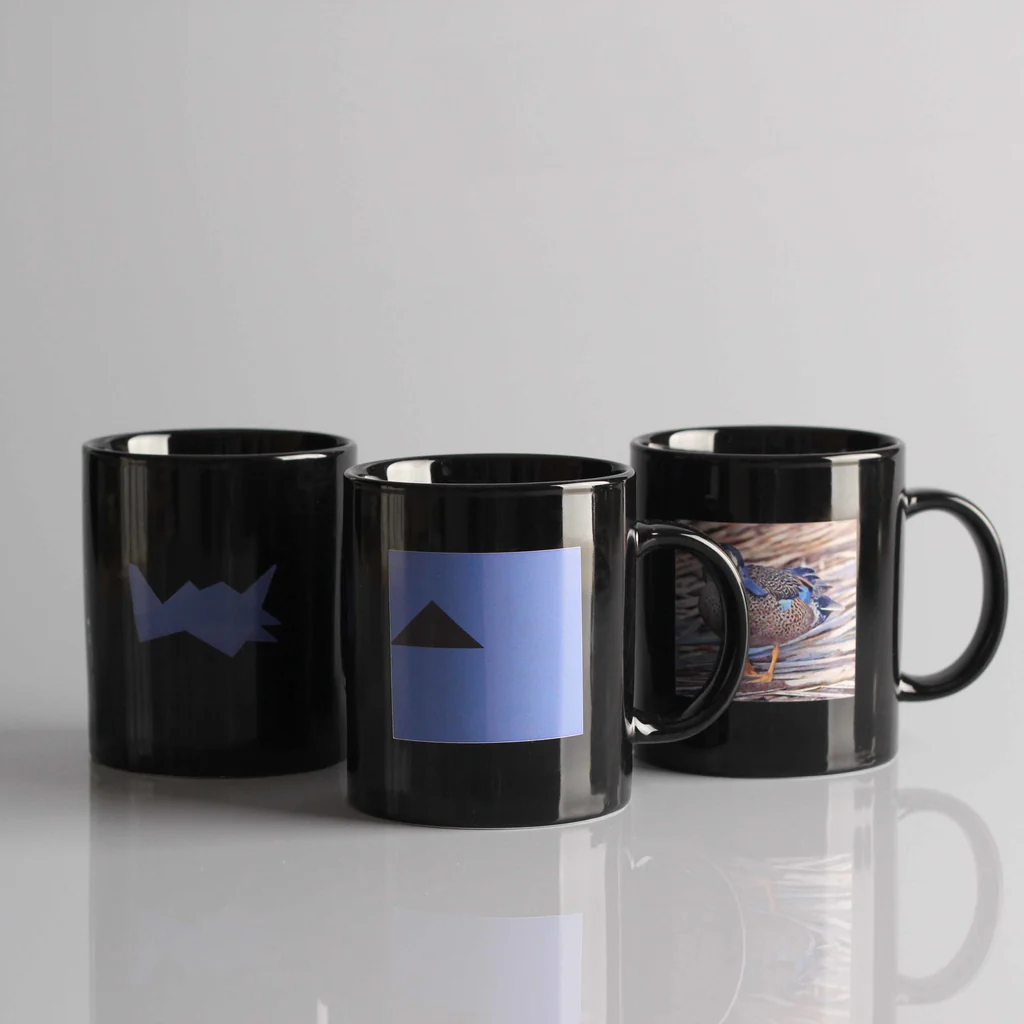 White Textured Sticker on Dark Substrate (Black Ceramic Mug)